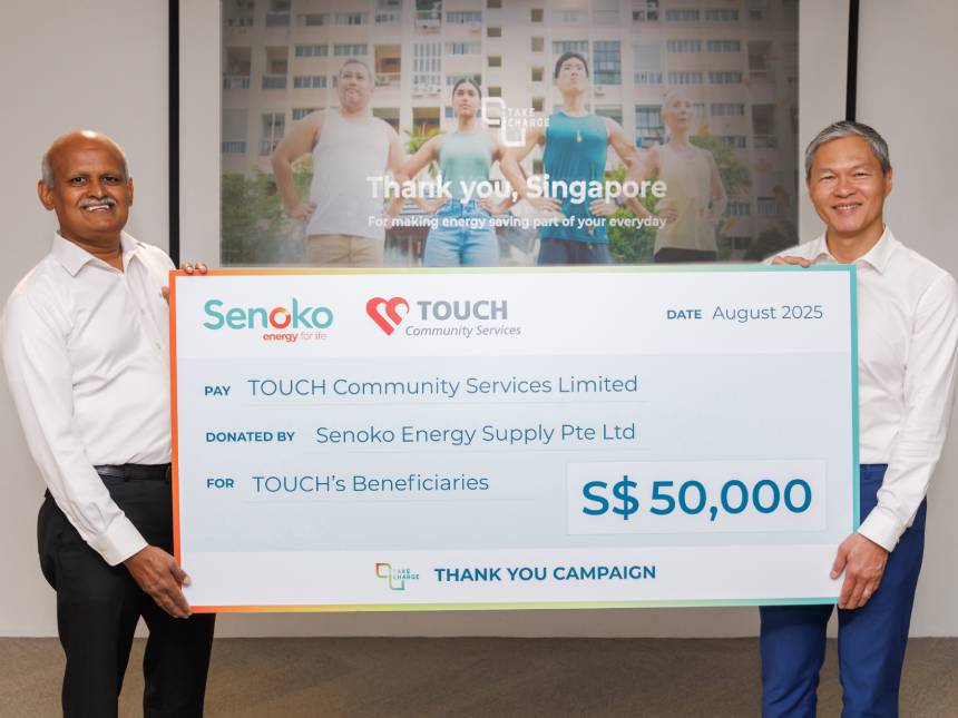 Touch Community receiving $50,000 donation cheque from Senoko Energy's Thank You Campaign.